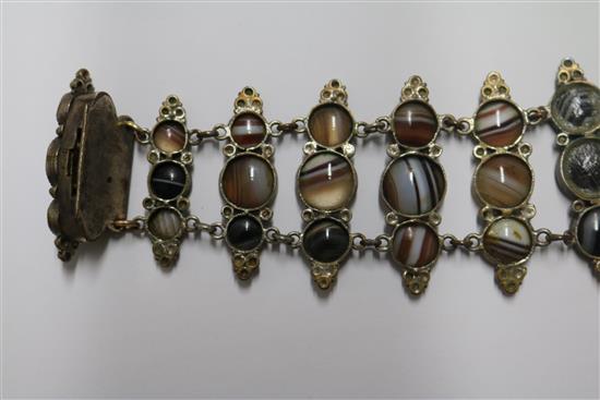 Two banded agate bracelets, one in gilt metal, one in white metal.